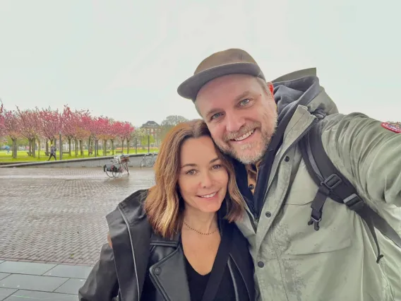 Gina and August Benzien taking a selfie photo together.